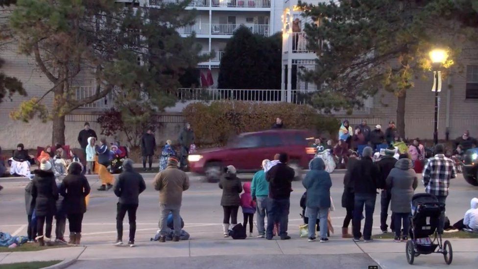 Footage showing a car about to hit a parade in Waukesha, Wisconsin