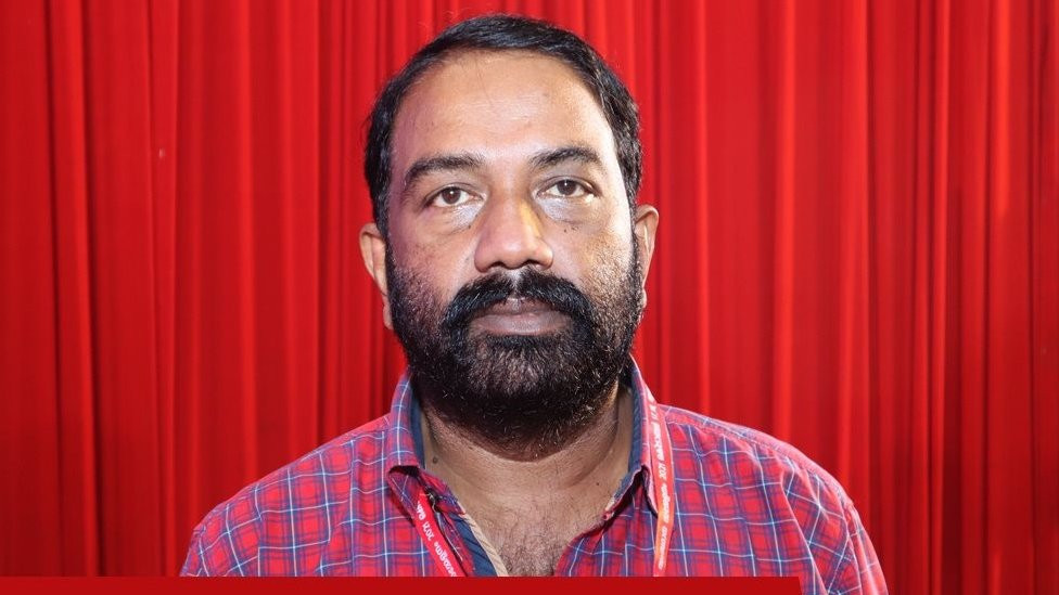 Woman's father in a poster