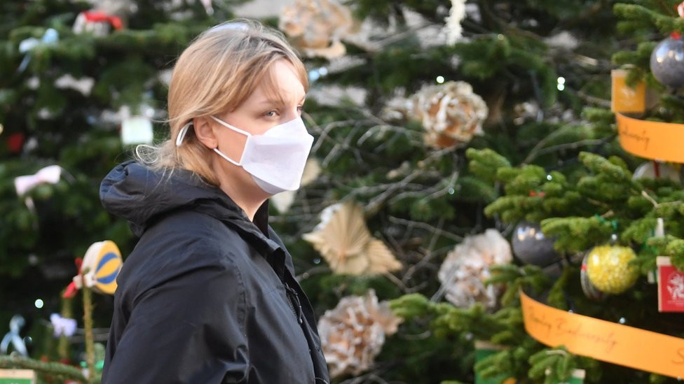 Woman in a mask in Covent Garden