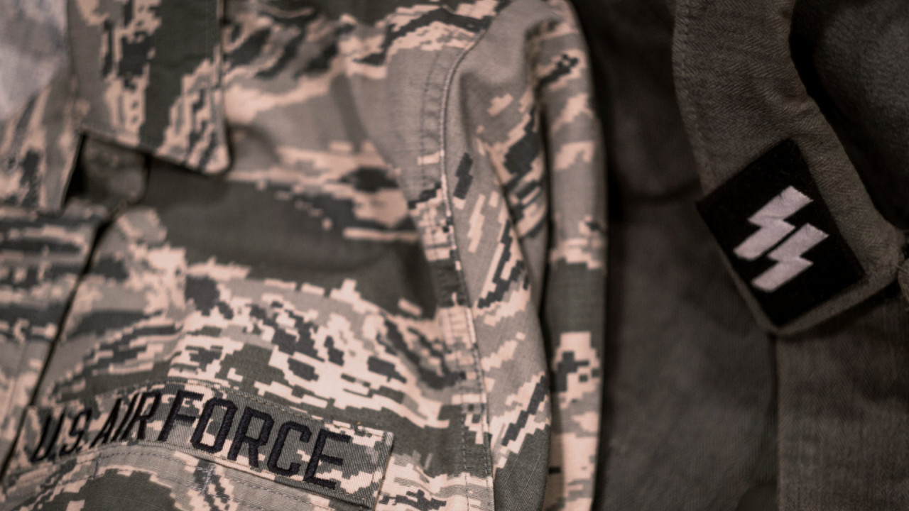 Mike's USAF uniform and Nazi uniform hanging side by side