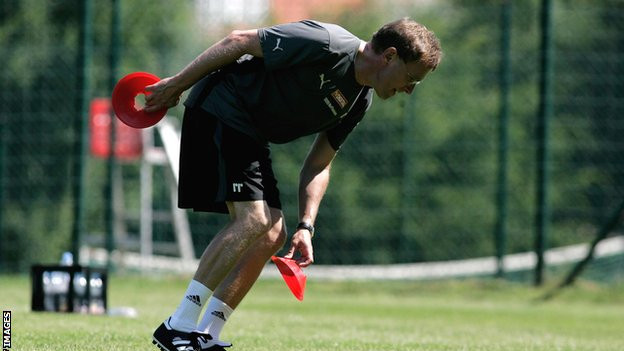 Rangnick, putting out training cones as Hoffenheim manager in 2008
