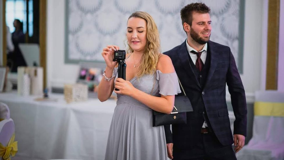 Tom Bourlet and his partner at the wedding that they lost weight for