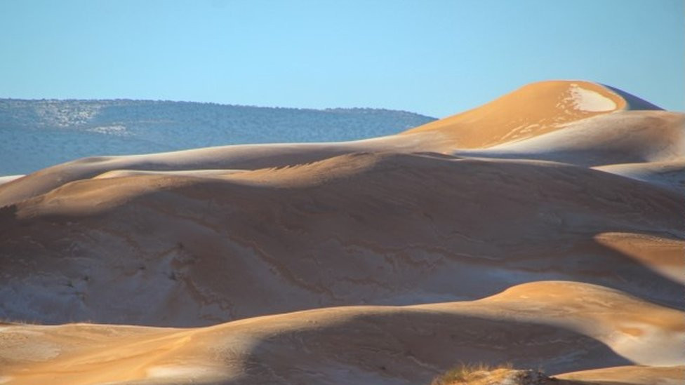 Picture dated January 8th shows a covering of snow and ice in the Sahara Desert near Ain Sefra in northwestern Algeria.