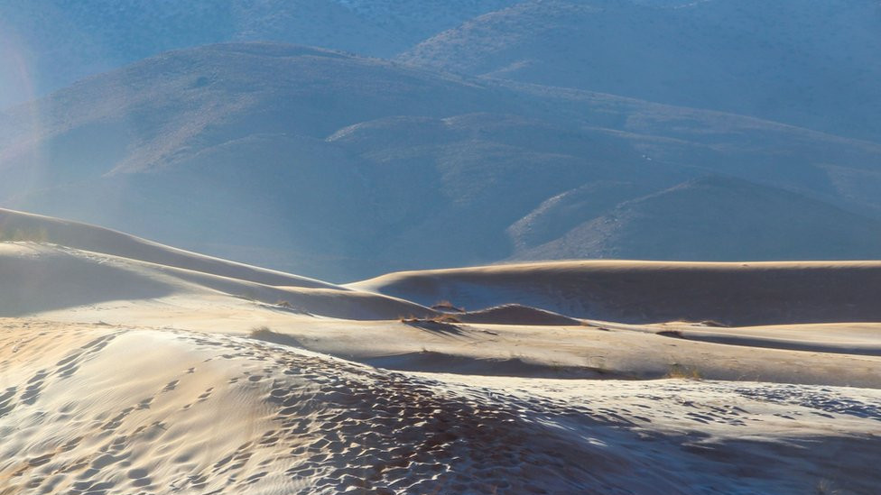 Picture dated January 8th shows a covering of snow and ice in the Sahara Desert near Ain Sefra in northwestern Algeria.