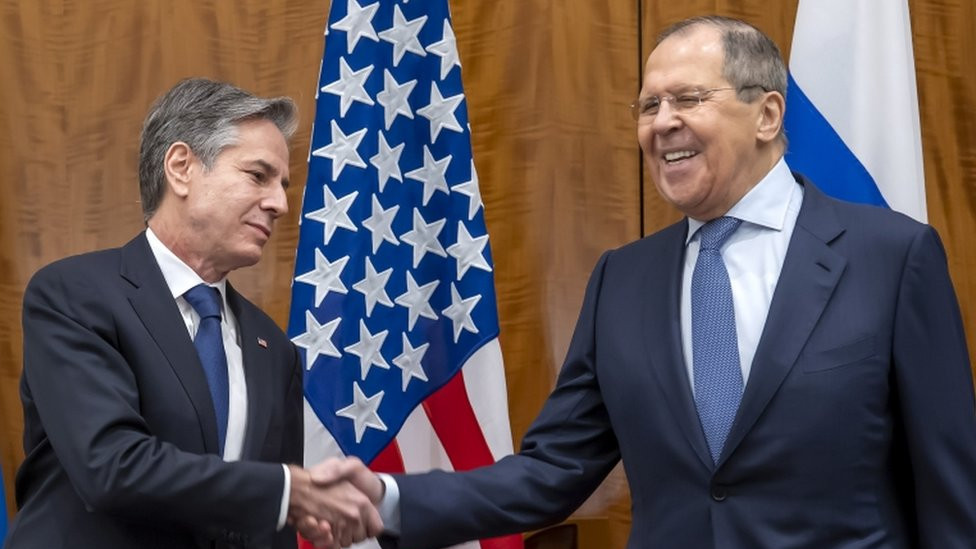 US Secretary of State Antony Blinken and Russian Foreign Minister Sergei Lavrov shake hands during bilateral talks on soaring tensions over Ukraine in Geneva, Switzerland