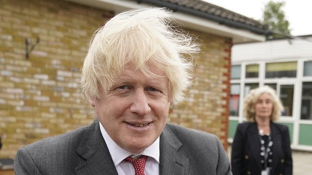 Boris Johnson holding birthday cake on 19 June 2020