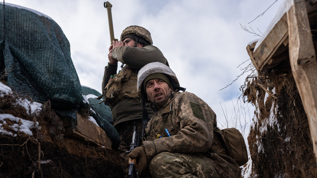 Ukrainian soldiers in trenches near Luhansk