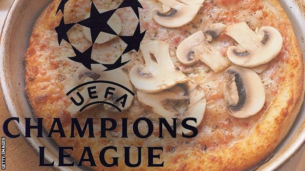 Pizza with Champions League logo.