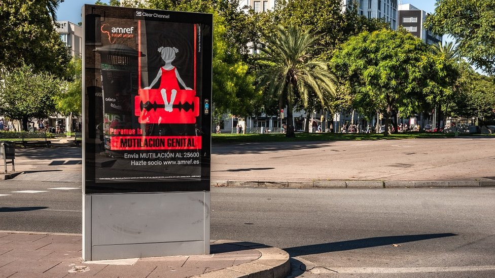 A poster of the campaign against female genital mutilation is seen in Barcelona.