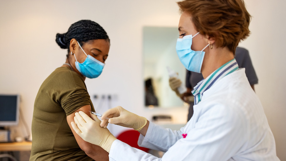 Woman getting jab