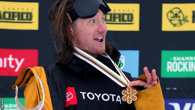 Woods celebrating his 2019 World Championship title