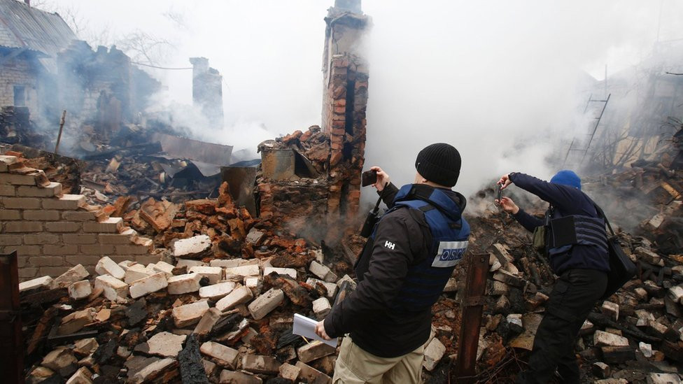 OSCE monitors photograph a house in Avdiyivka shelled by rebel forces