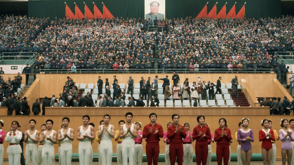 Chinese gymnasts stand in formation after having performed for visiting US President Richard Nixon.