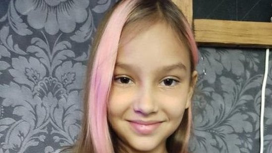 Polina was with her family when their car came under fire