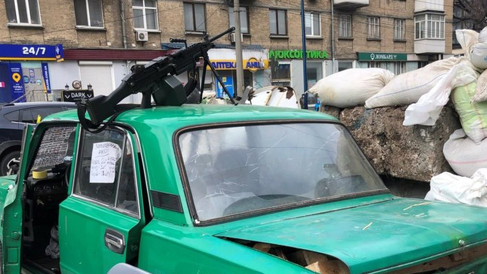 A car positioned at a roadblock in Kyiv