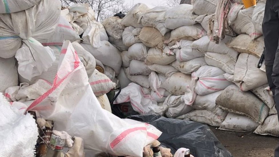 A barricade with molotov cooktails