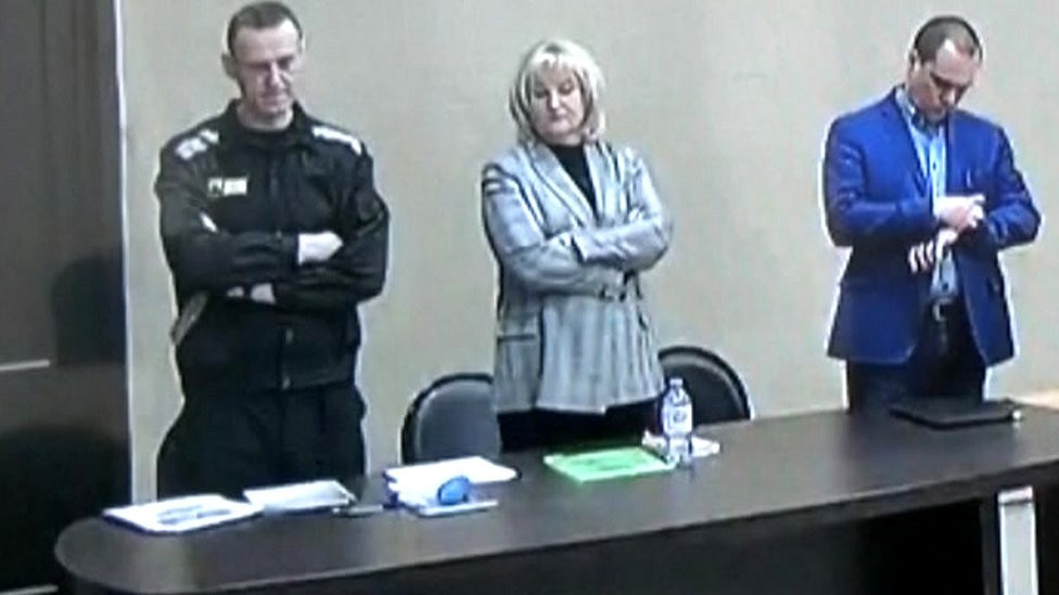 Navalny stood in the makeshift court in Pokrov jail as the verdict was read out