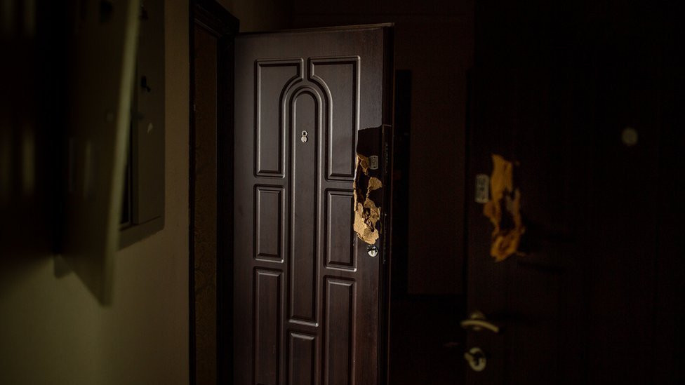 Every door in Vitaliy Brezhnev's apartment building had been blown open with a shotgun.