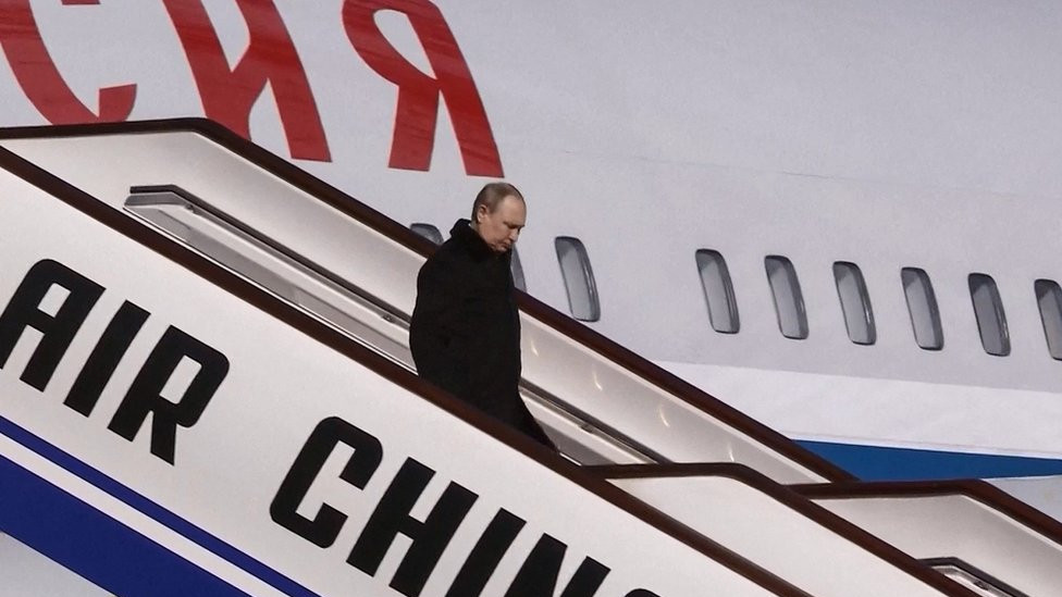 Russia's President Vladimir Putin disembarking upon his arrival in Beijing on February 4, 2022, ahead of his meeting with China's president and the opening ceremony of the 2022 Winter Olympic Games