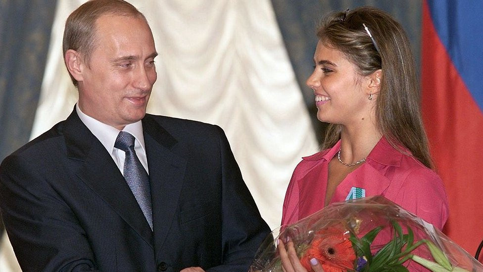 Putin and Kabaeva at a ceremony in 2001