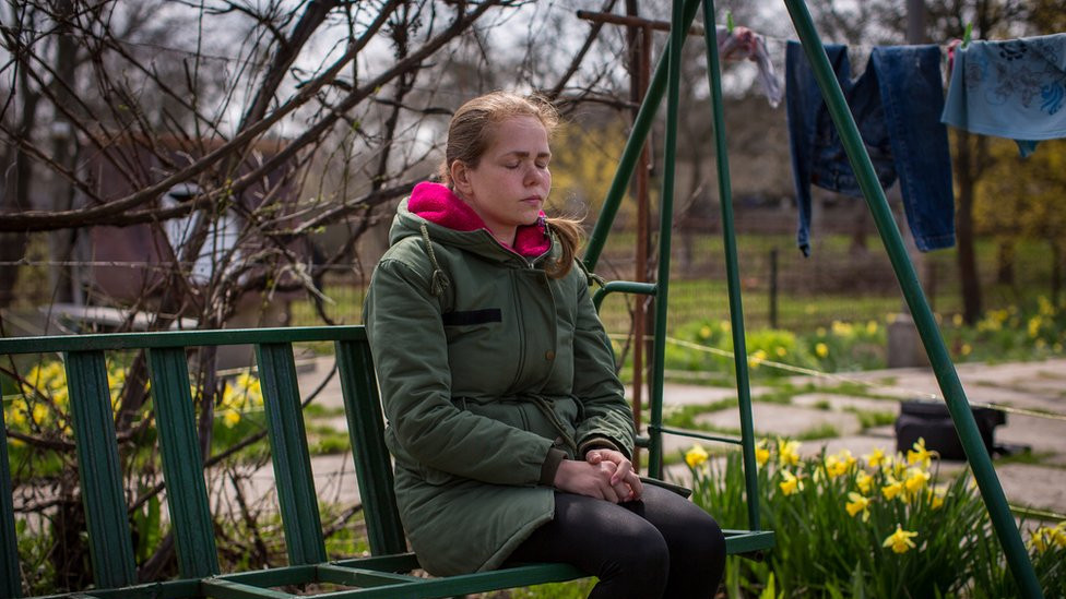 Maria Sayenko in her garden in Hurivshchyna. "It's like he disappeared into thin air," she said.