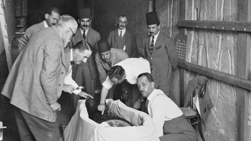 British surgeon Douglas Derry makes the first incision into Tutankhamun's mummified body