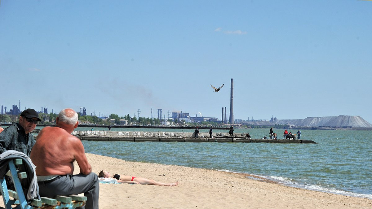 Sunbathing with the steelworks in the background