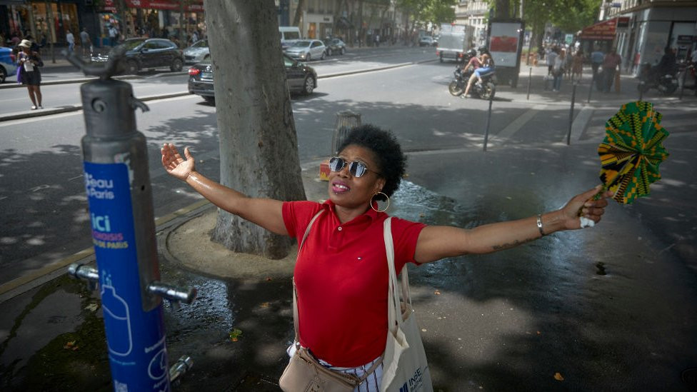 Image shows woman cooling in heat