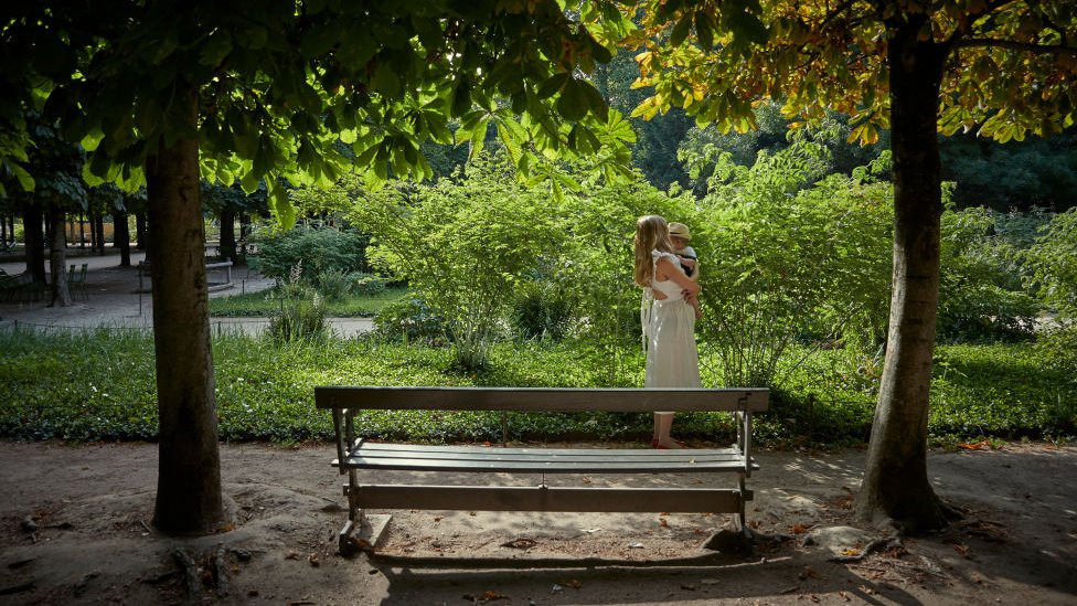 Image shows mother and baby in park