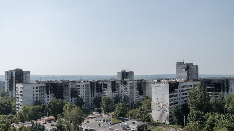 All around Saltivka, burn marks rise up from the windows where fires raged. Nearly every building has been hit