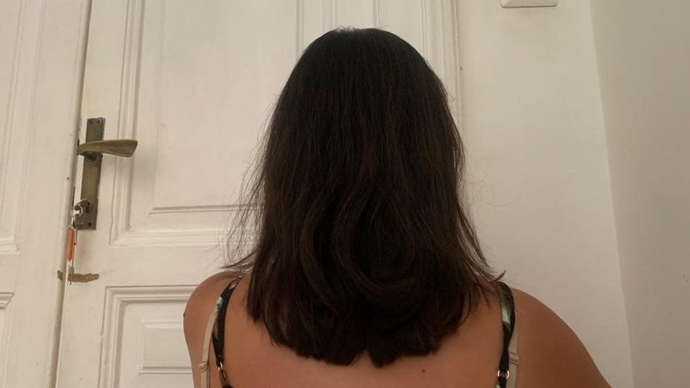 Photo of Maria taken from behind