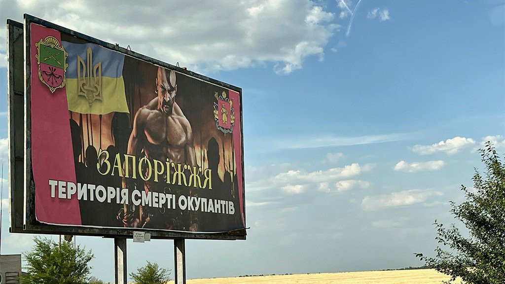 Poster reads: Zaporizhzhia land of death to the occupiers