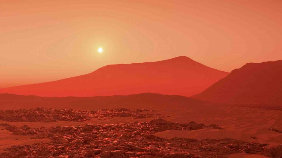 Sun over a barren landscape