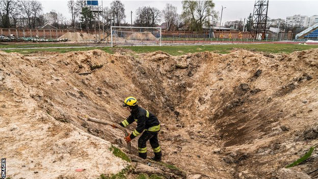 A crater from an artillery or missile strike in the middles of Desna's pitch
