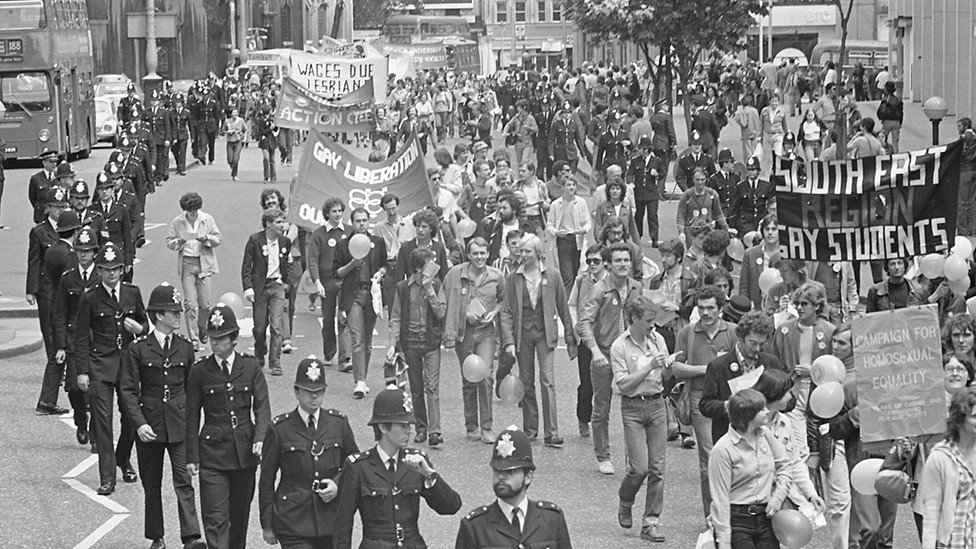 People attend the Pride march in 1979