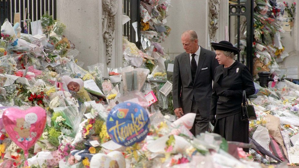 The Queen & Prince Philip view flowers laid to commemorate the death of the Princess of Wales