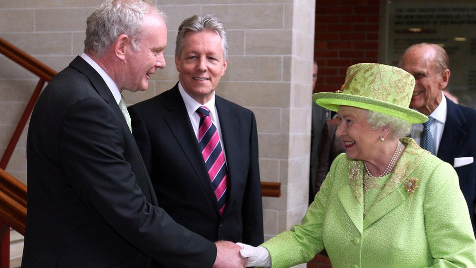 Martin McGuinness shakes hands with the Queen