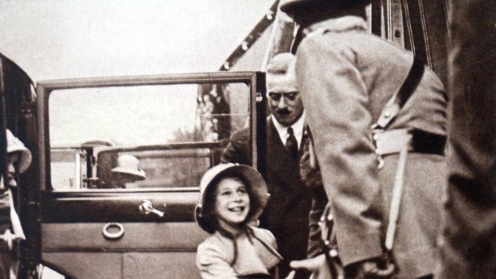Princess Elizabeth being greeted by an official, Windsor.