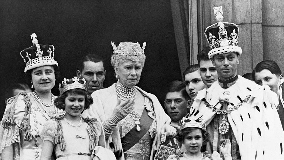 The Royal Family on the balcony at Buckingham Palace after the coronation of King George VI of England. Shown are (from left to right): Queen Elizabeth; Princess Elizabeth; Queen Mary the Queen Mother; Princess Margaret; and King George VI.