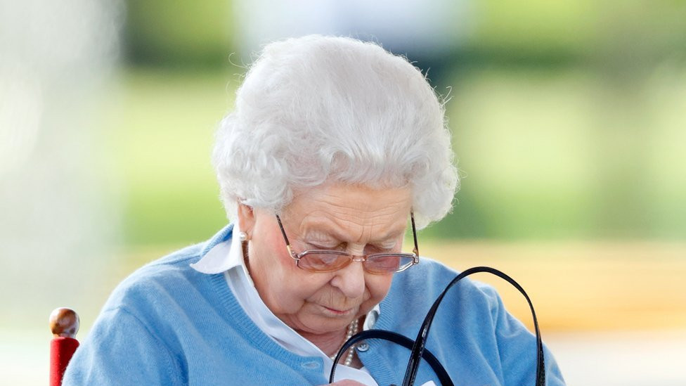 Queen Elizabeth II watches her horse Sparkler compete in the Flat Ridden Sport Horse class on day one of the Royal Windsor Horse Show in Home Park on 9 May 2018 in Windsor, England.
