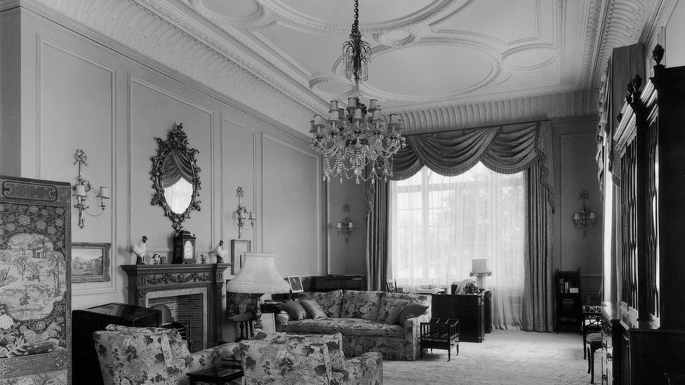 Princess Elizabeth's sitting room on the first floor of Clarence House in London, 1949. The house was built in 1825-27 by John Nash for the Duke of Clarence, later King William IV. There are Chippendale and Sheraton pieces amongst the furniture and the ceiling is a Nash original.