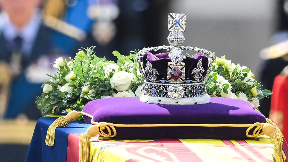 King Charles III and members of the royal family behind Queen Elizabeth II's flag-draped coffin as it is taken in procession on a Gun Carriage of The King's Troop Royal Horse Artillery from Buckingham Palace to Westminster Hall on 14 September 2022