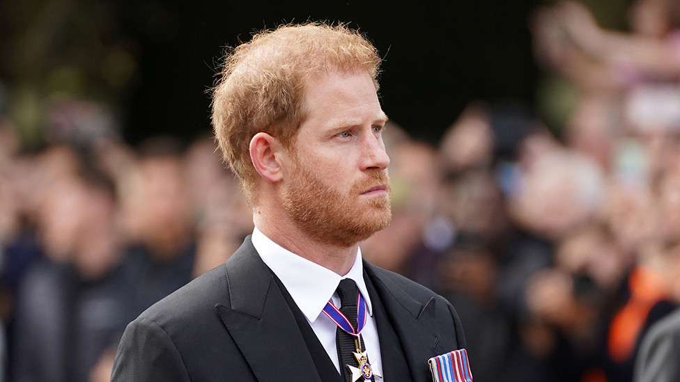 The Duke of Sussex follows the coffin of Queen Elizabeth II during the ceremonial procession from Buckingham Palace to Westminster Hall on 14 September 2022