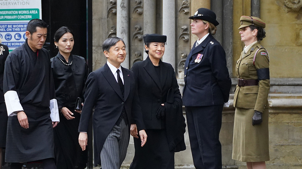 Emperor of Japan Naruhito (centre) and wife Empress Masako arrive at the State Funeral of Queen Elizabeth II, held at Westminster Abbey, London