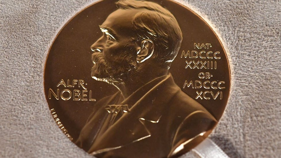 The Nobel prize medal, presented to Charles M. Rice in Physiology or Medicine