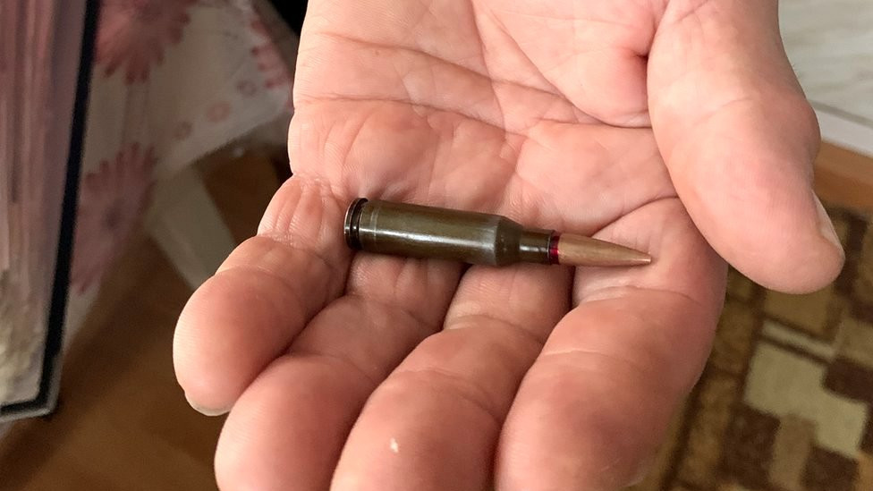 Liudmyla Mymrykova kept the bullet dropped by the Russian soldier who attacked her at her home