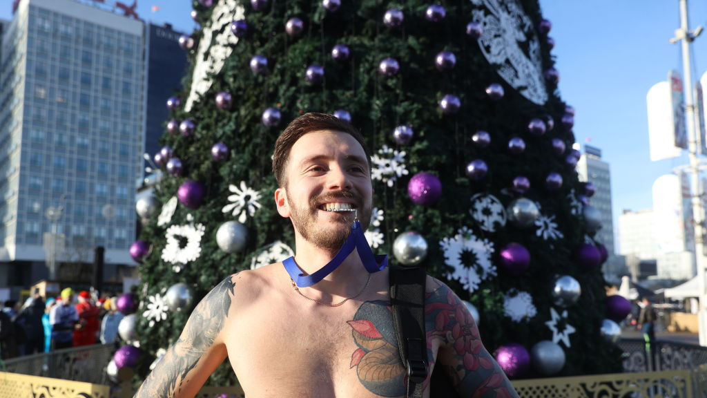 A competitor in Minsk's annual 1 January "Sobriety Run" enjoying warmer than usual temperatures