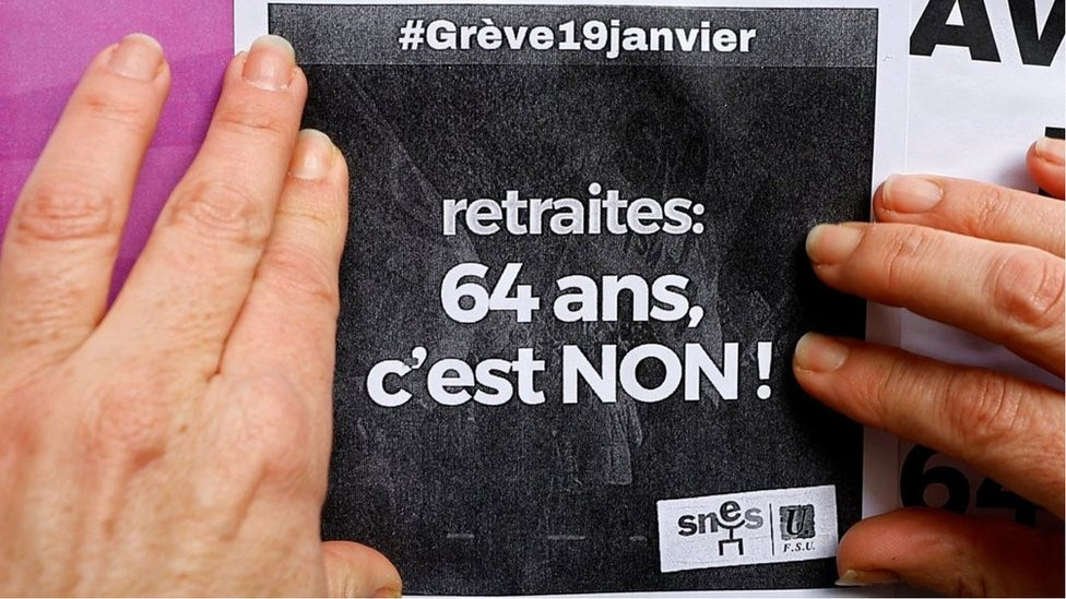 A sign saying Pensions: No at 64