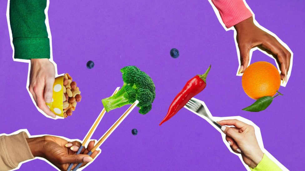 Hands holding different type of food