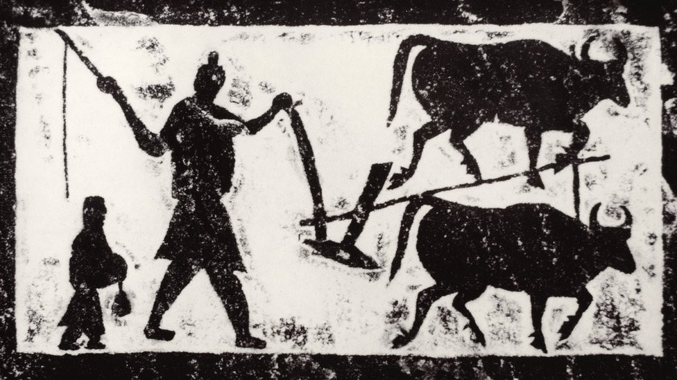 Painting of a farmer and ox plow